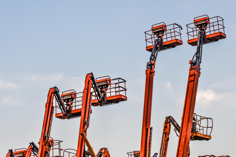 ### The Art of High-Reach: How Articulated Boom Lifts Conquer the Most Complex Work Environments in the UAE In a city like Dubai, where architectural marvels and intricate infrastructure projects are the norm, construction and maintenance tasks often present unique challenges. Reaching a work area isn't always a straight line up. It might mean maneuvering over a building wing, reaching around a large piece of machinery, or accessing a tight, cluttered space. This is where the articulating boom lift, with its distinct "knuckle" or "up-and-over" capability, becomes an invaluable asset. While telescopic boom lifts are champions of sheer vertical and horizontal reach, the articulating boom lift is the master of high-reach precision and flexibility. At Lift Max Pro Equipment Rental L.L.C., we've seen firsthand how these sophisticated machines redefine what's possible in the most complex work environments across the UAE. ### Beyond the Straight Line: The Flexibility of an Articulated Boom An articulating boom lift is defined by its multi-jointed arm. The boom can bend at multiple points, allowing the operator to navigate obstacles that would be impossible for a traditional straight boom. This makes it the go-to choice for a wide array of specialized applications. #### Navigating Congested Sites Dubai’s urban environment, with its densely packed buildings and ongoing development, often leaves little room for maneuverability. An articulating boom lift can be positioned in a tight spot, and its arm can extend up and over obstacles like utility poles, air conditioning units, or existing building structures to reach the precise work area. This eliminates the need for complex, time-consuming scaffolding and saves valuable space on the job site. #### Indoor and Sensitive Environments For tasks inside large structures like warehouses, shopping malls, and airports, an electric articulating boom lift is the ideal solution. Its quiet, zero-emission operation makes it suitable for indoor use where noise and air quality are critical. The lift's ability to navigate narrow aisles and access high shelving or intricate ceiling fixtures with precision is unmatched. #### Specialized Applications in Construction and Maintenance The versatility of the articulated boom lift extends to numerous sectors: * **HVAC and Electrical Work:** Reaching complex systems of pipes, ducts, and wiring often requires working around numerous obstructions. The multi-jointed arm allows technicians to get to the exact point of work safely and efficiently. * **Façade and Cladding Repair:** For buildings with complex architectural designs, an articulating lift can maneuver to reach specific sections, balconies, and overhangs that a telescopic lift cannot. * **Landscaping and Tree Trimming:** Trimming tall palm trees or reaching branches over fences and other structures is a perfect job for an articulating boom, as it provides a safe platform to work in difficult-to-reach spots. * **Film and Media Production:** The flexibility and quiet operation of these lifts make them ideal for capturing high-angle shots for movies, commercials, and events without disrupting the set. ### Safety and Stability in Any Environment Despite their complex design, articulating boom lifts are built with safety as a top priority. They are equipped with robust outriggers and leveling systems to ensure stability on uneven terrain. This is particularly important for outdoor projects on construction sites or in the rugged landscapes of the UAE. The lifts’ intuitive controls allow for precise, smooth movements, giving the operator full control at all times. ### Find Your Solution with Lift Max Pro At Lift Max Pro Equipment Rental L.L.C., we offer a wide variety of articulated boom lifts with working heights that can be tailored to any project. Our fleet is meticulously maintained and regularly inspected to meet the highest safety standards. Our team of experts is dedicated to helping you find the perfect high-reach solution that ensures your project is completed safely, efficiently, and on schedule. When your project demands more than just a straight reach, trust the experts at Lift Max Pro. Phone: +971 521 155 755 | +971 589 916 394 Email: info@liftmaxrental.com | sales@liftmaxrental.com Address: Industrial Area 1, Ras Al Khor, Dubai, UAE